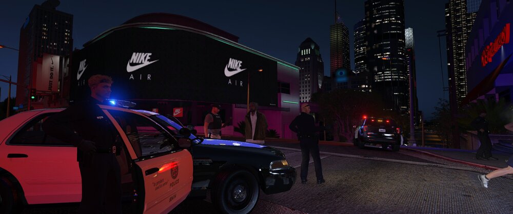 Could contain: vehicle, land vehicle, wheel, outdoor, building, tire, sky, car, night, purple