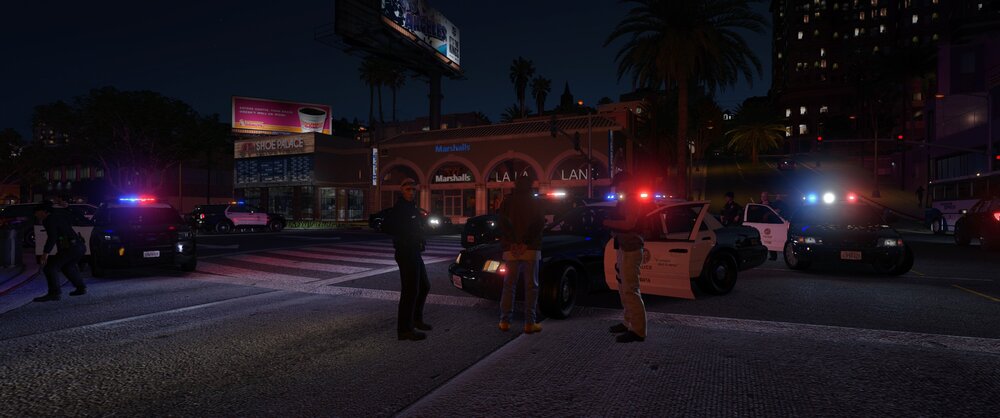 Could contain: outdoor, sky, street light, tree, night, street, building, road, electricity, light, people, ground, person, city