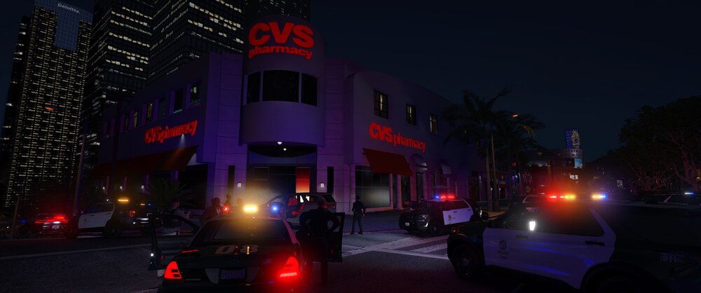 Could contain: land vehicle, vehicle, outdoor, building, sky, car, night, electricity, street light, road, wheel, street, city, light