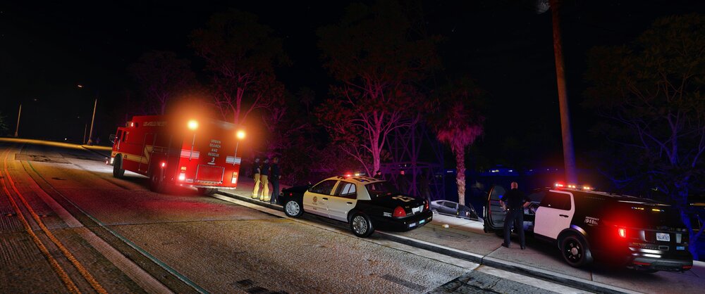 Could contain: outdoor, vehicle, land vehicle, road, tree, wheel, firefighter, street light, car, night, sky, truck, electricity, street, light, ground, way, red, parked