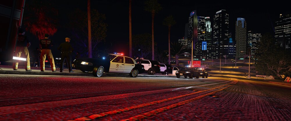 Could contain: outdoor, building, road, skyscraper, vehicle, sky, land vehicle, night, downtown, street, street light, city, electricity, light, ground