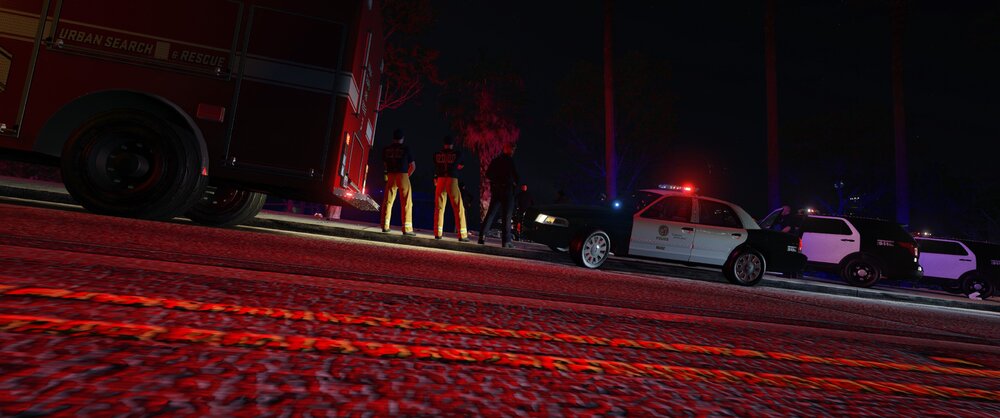 Could contain: outdoor, vehicle, wheel, firefighter, road, land vehicle, truck, red, ground, fire, night