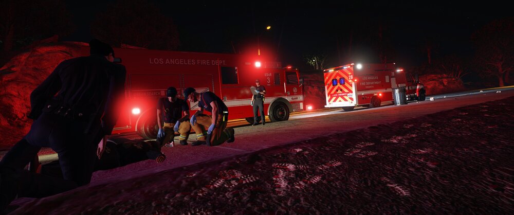 Could contain: outdoor, firefighter, sky, night, red, ground, light, people, person, fire, winter, street