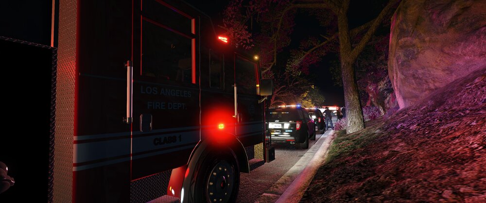 Could contain: outdoor, land vehicle, light, building, vehicle, street light, street, night, way, red, traffic light, stop, ground