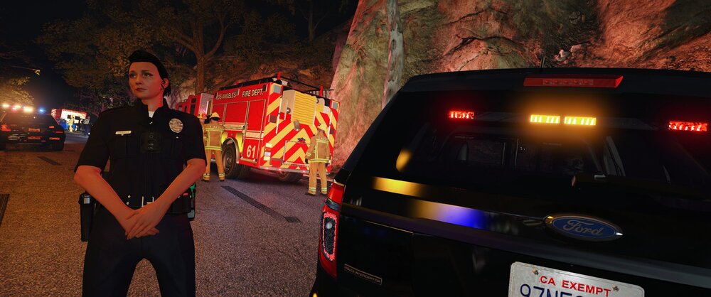 Could contain: vehicle, land vehicle, clothing, outdoor, person, man, car, automotive tail & brake light, wheel, text, vehicle registration plate, automotive exterior, footwear, automotive lighting, standing, ground, night