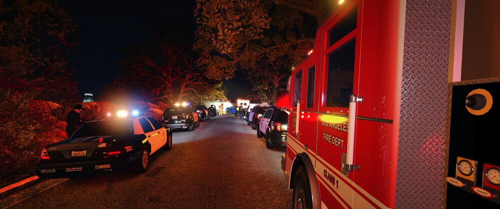 Could contain: outdoor, vehicle, land vehicle, firefighter, emergency service, car, transport, light, fire, night, red, truck, street, ambulance, parked