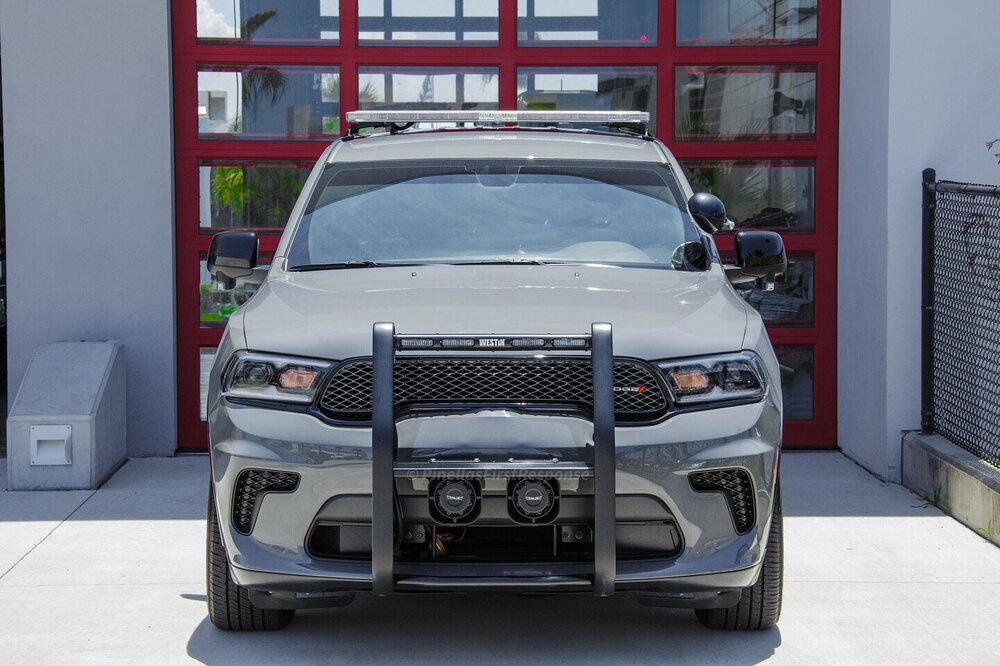 Could contain: vehicle, land vehicle, wheel, tire, bumper, car, auto part, automotive exterior, building, sport utility vehicle, grille, automotive design, general motors, outdoor, parked