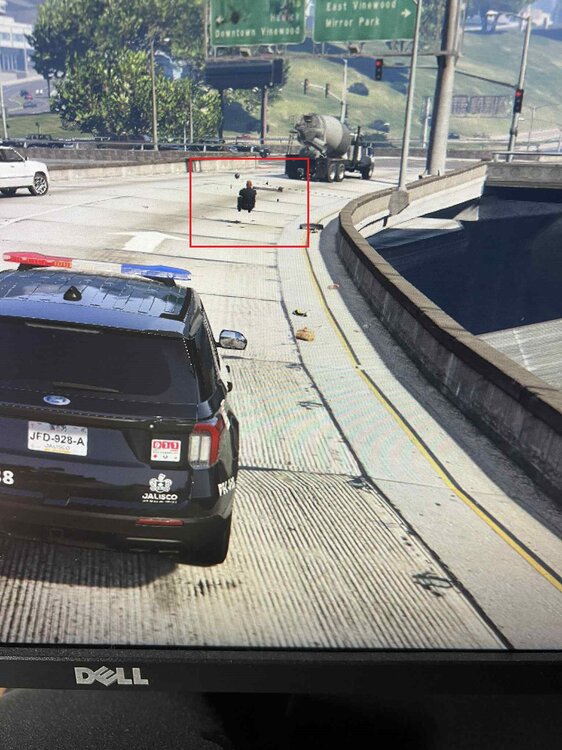 Could contain: text, vehicle, land vehicle, outdoor, wheel, road, vehicle registration plate, ground, track, car, street, driving, city