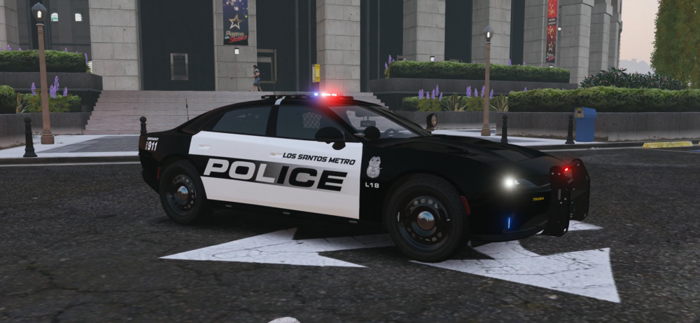 Could contain: vehicle, land vehicle, outdoor, car, wheel, road, tire, building, auto part, street, police, ground