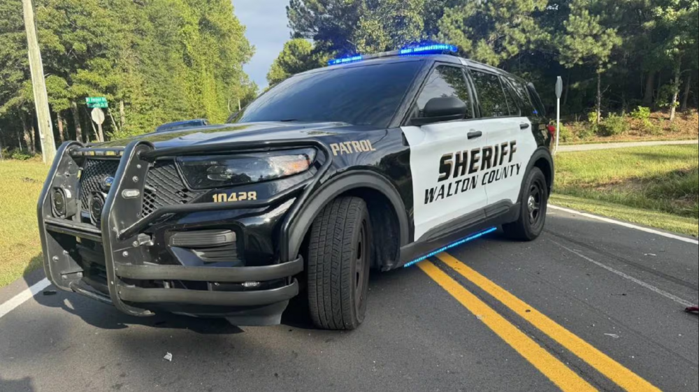 Could contain: vehicle, land vehicle, outdoor, wheel, tire, road, police, car, auto part, bumper, ford, motor vehicle, text, grille, chevrolet, police car, automotive exterior, sport utility vehicle, law enforcement, vehicle registration plate, ford motor company, compact sport utility vehicle, street