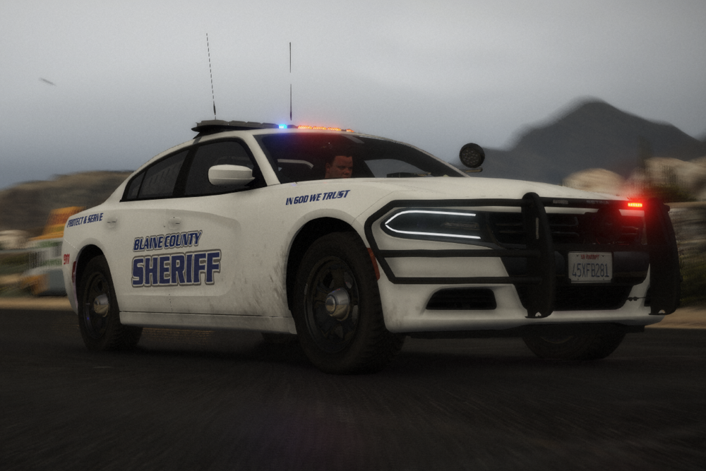 Could contain: vehicle, land vehicle, wheel, tire, sky, transport, outdoor, police car, auto part, bumper, car, road, automotive design, full-size car, law enforcement, mid-size car, automotive light bulb, automotive exterior, sports sedan, police