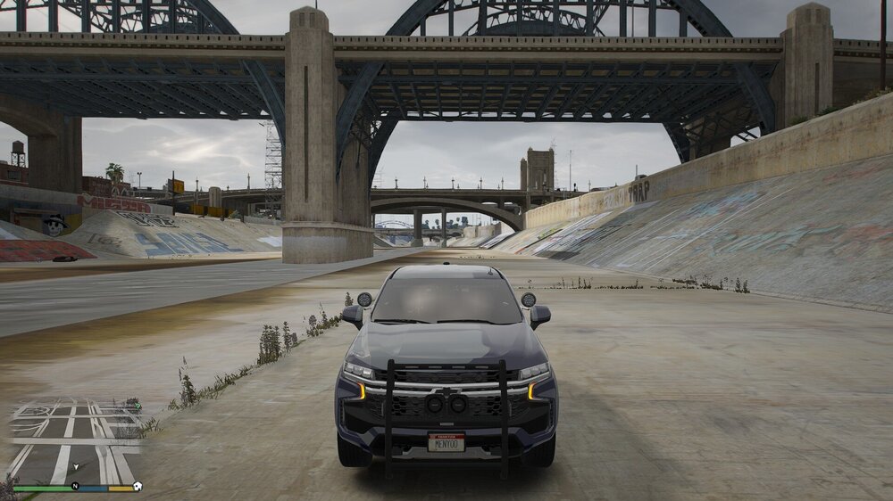 Could contain: vehicle, land vehicle, wheel, sky, outdoor, tire, car, building, ground, road, bridge