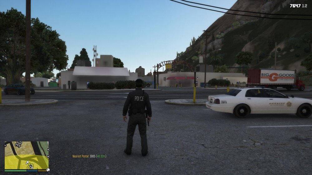 Could contain: outdoor, vehicle, land vehicle, sky, road, wheel, tree, family car, car, street, person