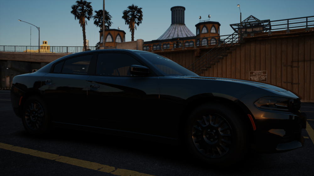 Could contain: vehicle, land vehicle, wheel, sky, tire, outdoor, hood, automotive design, transport, auto part, luxury vehicle, alloy wheel, car, parked, street
