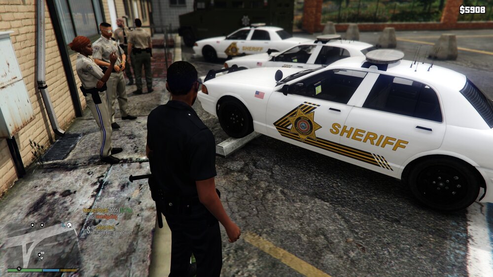 Could contain: vehicle, land vehicle, wheel, clothing, tire, transport, text, outdoor, man, car, person, police, ground, parked