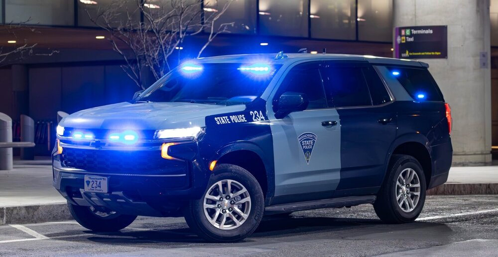 Could contain: vehicle, land vehicle, wheel, tire, sport utility vehicle, text, auto part, transport, car, bumper, compact sport utility vehicle, outdoor, vehicle registration plate, automotive exterior, crossover suv, motor vehicle, ford, automotive lighting, fender, mini suv, police, nissan, roof rack, automotive luggage rack, automotive tire, land rover, mini mpv, range rover, road, suv, blue, parked, street