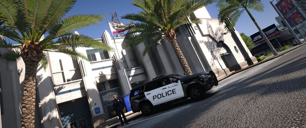 Could contain: outdoor, palm tree, vehicle, land vehicle, road, sky, car, arecales, wheel, street, building, text, date palm, plant, palm, city, tree, sign