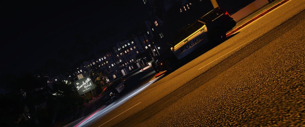 Could contain: outdoor, road, car, vehicle, night, street, darkness, ground, city, light