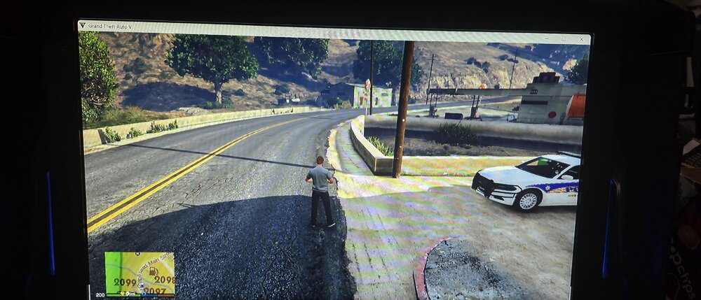 Could contain: text, land vehicle, vehicle, outdoor, wheel, road, tire, street, mountain, way, ground, car