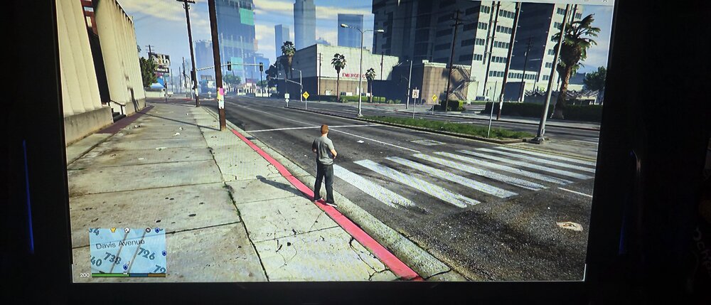 Could contain: outdoor, building, way, skyscraper, screenshot, ground, city, street