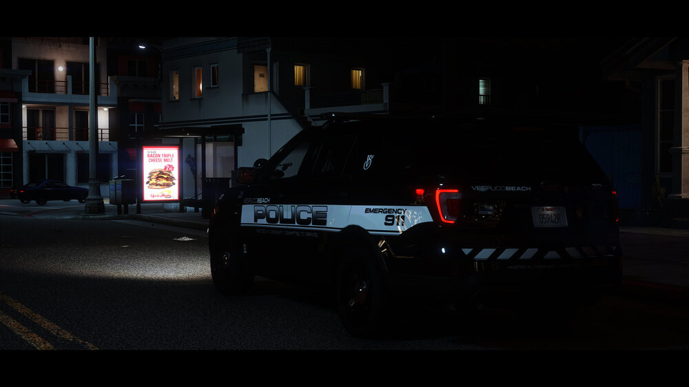 Could contain: text, vehicle, land vehicle, outdoor, vehicle registration plate, wheel, building, tire, auto part, automotive tail & brake light, automotive lighting, automotive exterior, road, family car, street, night, police, light, car, parked