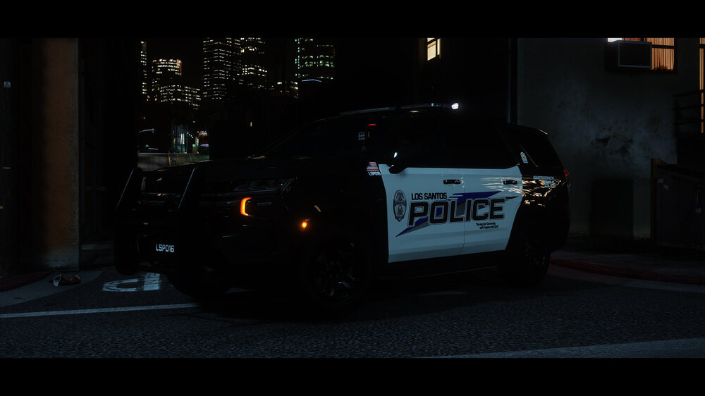 Could contain: text, vehicle, land vehicle, wheel, building, outdoor, tire, auto part, vehicle registration plate, car, light, police, street, night