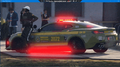 Could contain: vehicle, land vehicle, text, wheel, tire, sports car, transport, automotive design, motorsport, outdoor, law enforcement, car, performance car, person, police