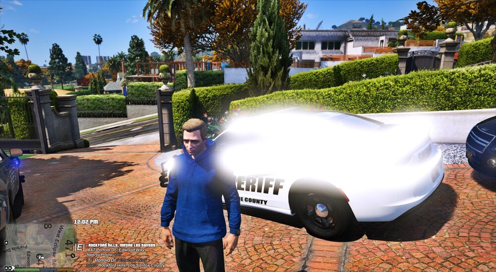 Could contain: outdoor, clothing, person, vehicle, car, tire, ground, tree, plant, wheel, man, land vehicle, parked