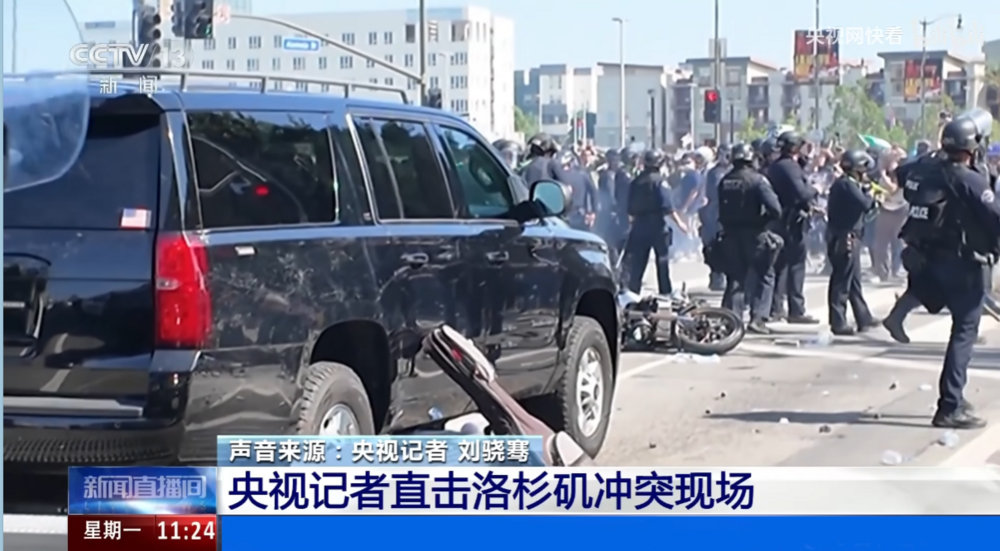 Could contain: vehicle, land vehicle, text, wheel, outdoor, tire, transport, auto part, motor vehicle, sport utility vehicle, man, automotive exterior, person, mode of transport, police, car, officer, people, street