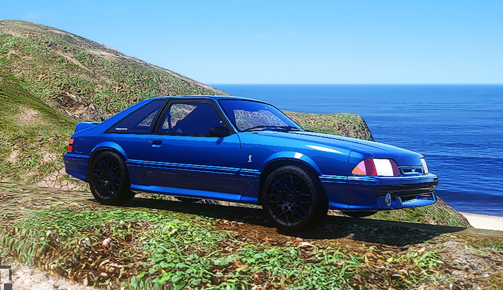 Could contain: vehicle, outdoor, grass, land vehicle, wheel, sky, transport, tire, bumper, car, blue