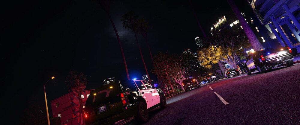 Could contain: outdoor, street, night, sky, street light, road, darkness, light, city