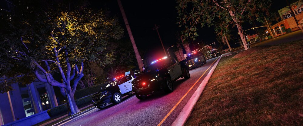 Could contain: outdoor, vehicle, land vehicle, tree, car, road, wheel, street, night, light, ground