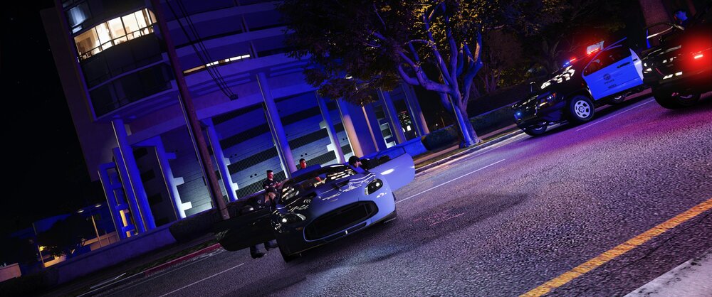 Could contain: outdoor, vehicle, car, land vehicle, street, road, building, wheel, light, night, city, traffic, way