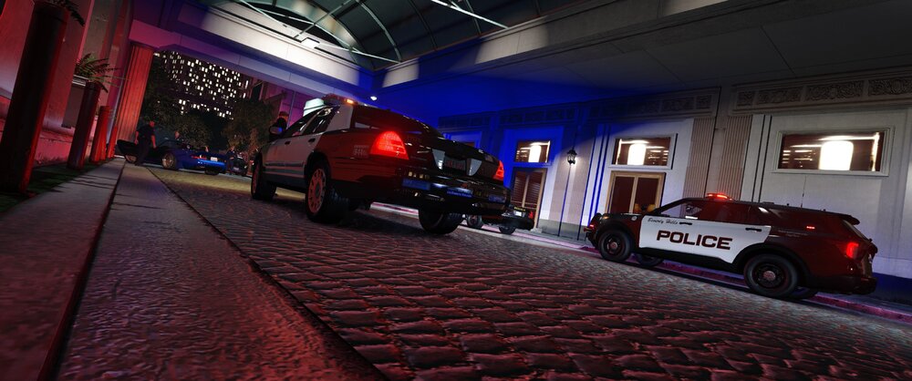 Could contain: vehicle, land vehicle, wheel, tire, building, car, automotive lighting, automotive design, automotive tail & brake light, auto part, transport, road, outdoor, parked, ground, red, ceiling