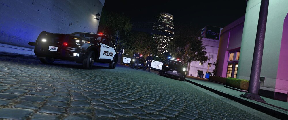 Could contain: land vehicle, vehicle, outdoor, building, text, wheel, car, vehicle registration plate, ground, tire, road, street, parked, curb, light, sidewalk, night