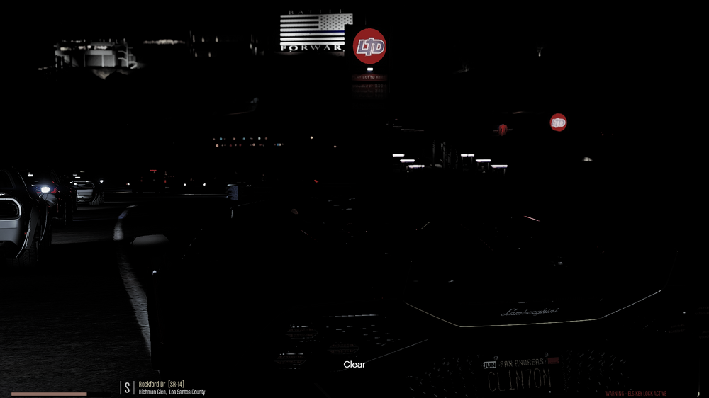 Could contain: darkness, car, text, screenshot, vehicle, outdoor, city, street, light, night