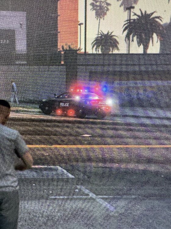 Could contain: building, clothing, street, person, outdoor, art