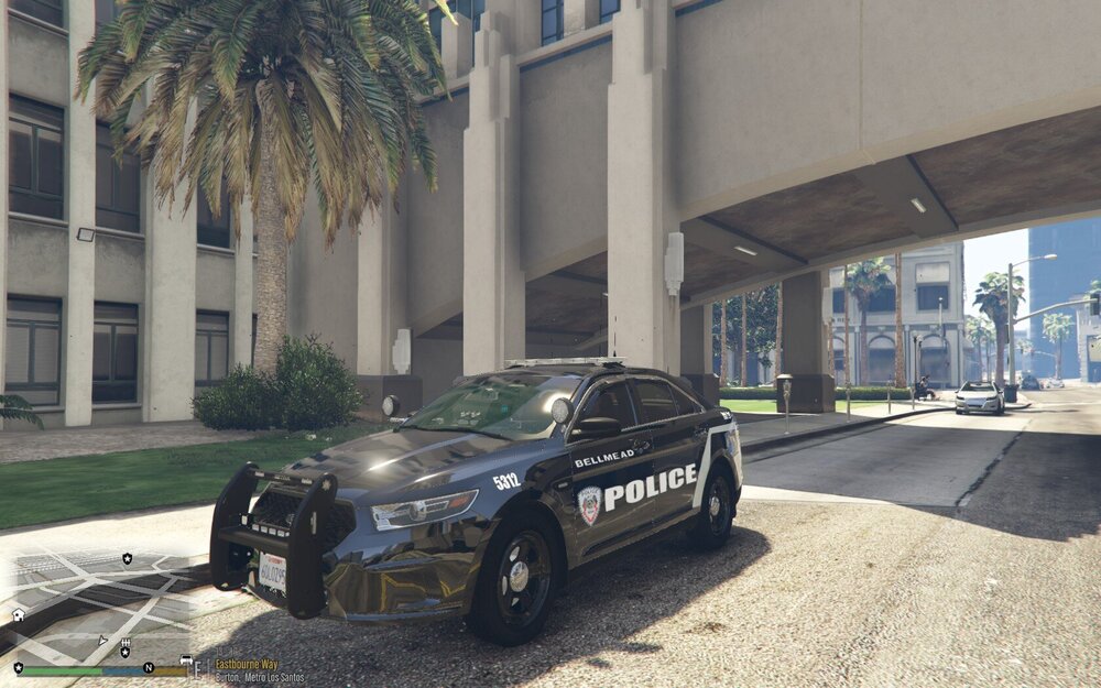 Could contain: vehicle, land vehicle, outdoor, wheel, building, car, ground, tire, transport, road, street, curb, parked, driving