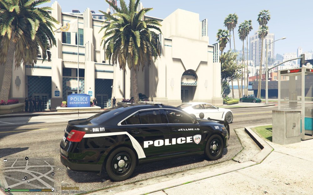 Could contain: vehicle, land vehicle, wheel, outdoor, tire, building, mid-size car, sports sedan, transport, auto part, full-size car, vehicle registration plate, automotive design, executive car, car, street, police, ground