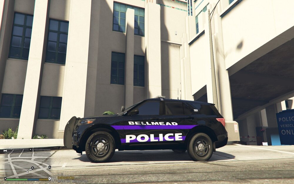 Could contain: wheel, land vehicle, vehicle, tire, text, building, outdoor, transport, car, auto part, road, police, street, purple