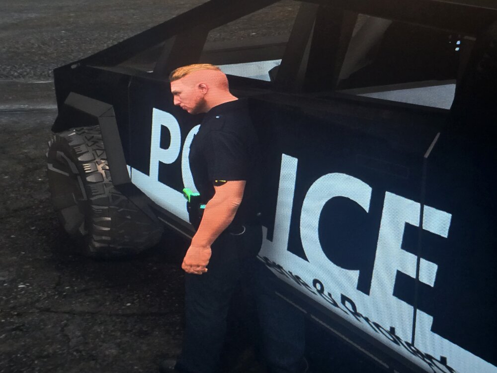 Could contain: clothing, person, tire, vehicle, man, wheel, outdoor, ground, auto part