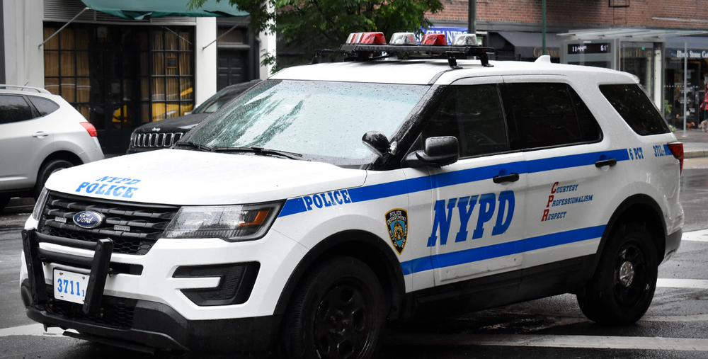 Could contain: vehicle, land vehicle, wheel, tire, text, ford, police car, sport utility vehicle, bumper, transport, law enforcement, outdoor, vehicle registration plate, compact sport utility vehicle, auto part, ford motor company, police, automotive exterior, emergency vehicle, emergency service, motor vehicle, car, suv, van