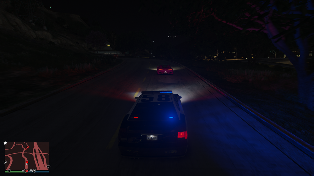 Could contain: vehicle, land vehicle, outdoor, screenshot, car, light, night