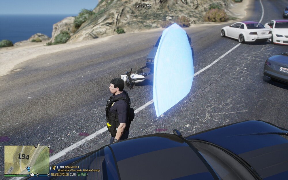 Could contain: outdoor, vehicle, land vehicle, road, wheel, surfing, person, car, surfboard, mountain, ground