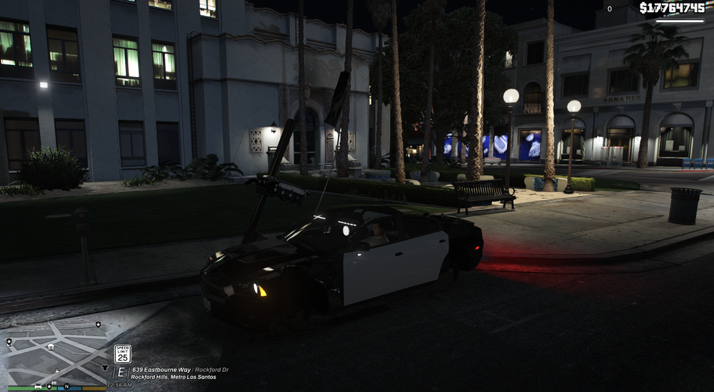 Could contain: car, screenshot, land vehicle, vehicle, building, outdoor, road, night, street, ground