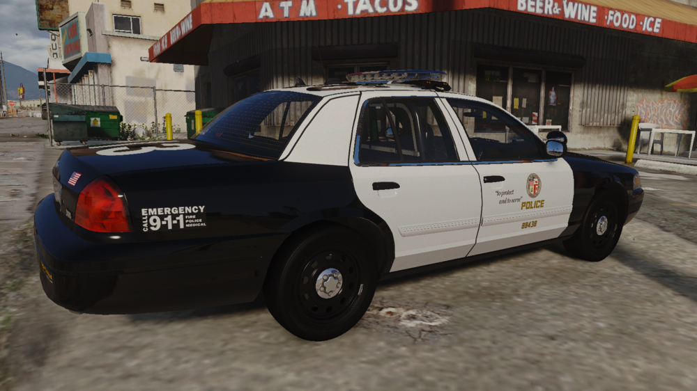 Could contain: land vehicle, vehicle, wheel, text, transport, outdoor, tire, car, vehicle registration plate, sedan, building, auto part, full-size car, ford crown victoria police interceptor, parked, ground, police, street
