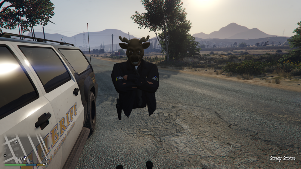 Could contain: outdoor, land vehicle, vehicle, sky, tree, mammal, wheel, ground, mountain, car