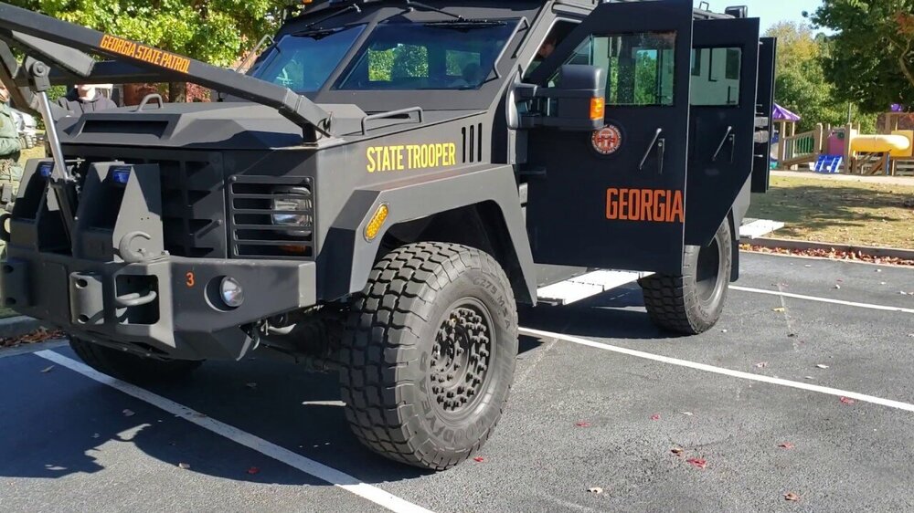 Could contain: vehicle, wheel, land vehicle, tire, transport, outdoor, auto part, automotive tire, tread, truck, road, off-road vehicle, fender, motor vehicle, automotive wheel system, mode of transport, bumper, automotive exterior, military, military vehicle, parked, ground, jeep