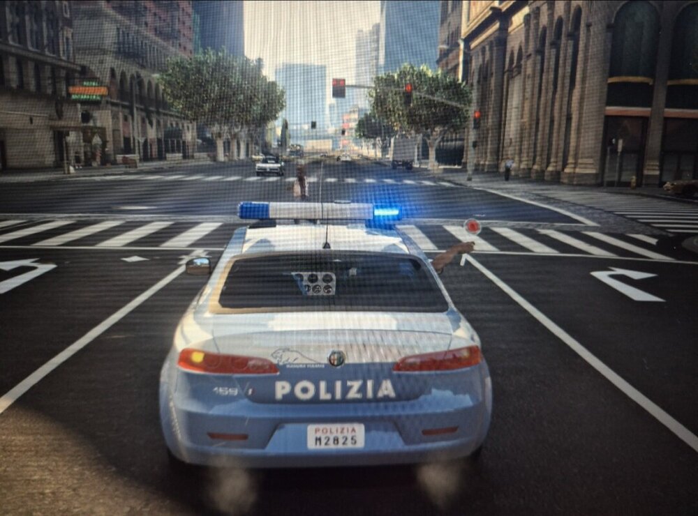 Could contain: vehicle, land vehicle, text, outdoor, road, building, police, vehicle registration plate, wheel, street, police car, traffic, mode of transport, lane, transport, van, automotive exterior, city, car, light