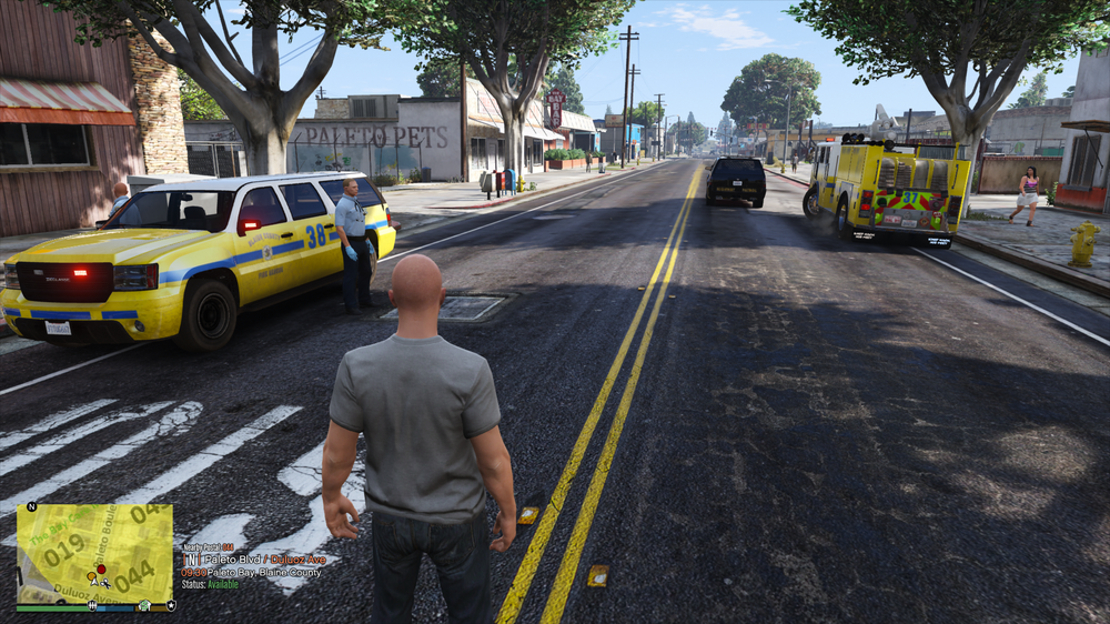 Could contain: outdoor, land vehicle, vehicle, car, wheel, road, sky, tree, taxi, yellow, clothing, way, truck, asphalt, road surface, text, person, street, man, tarmac, tire, firefighter, ground